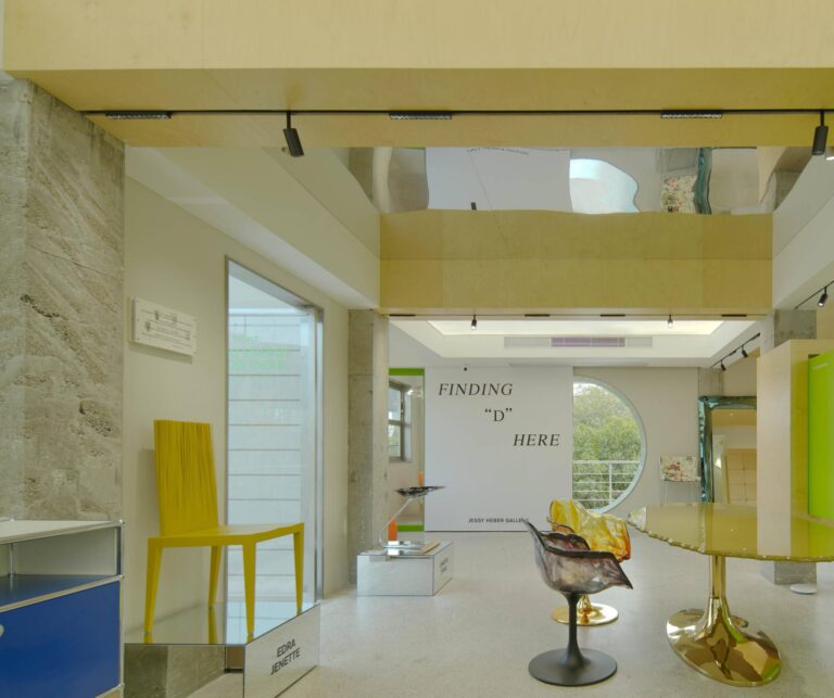 Bright education center corridor with yellow-green walls and custom seating