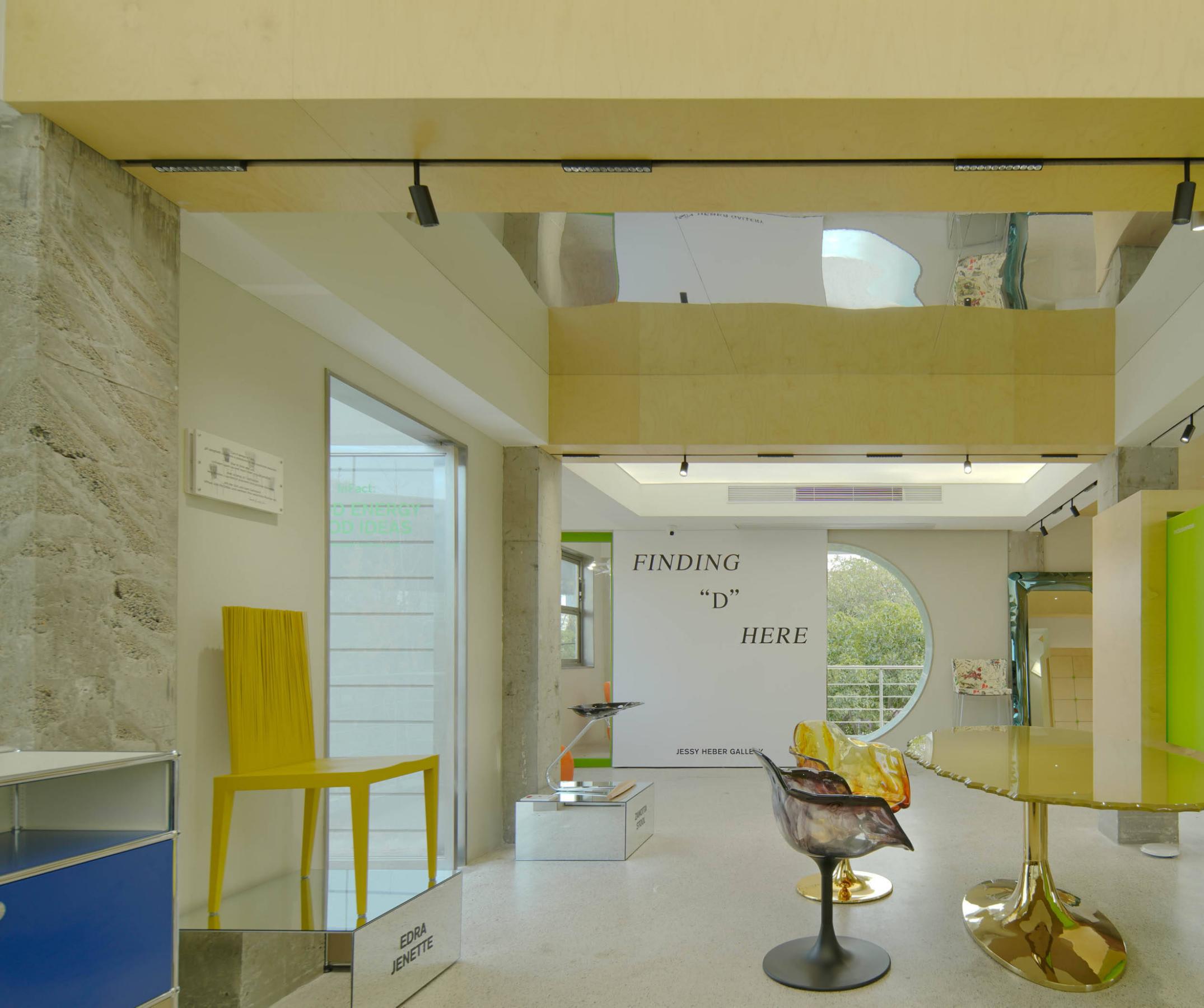 Bright education center corridor with yellow-green walls and custom seating