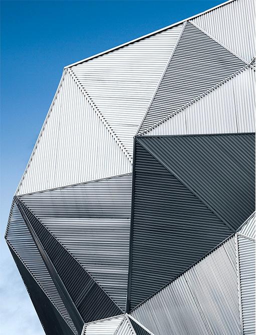 Close view of angular retail gallery exterior wall panels