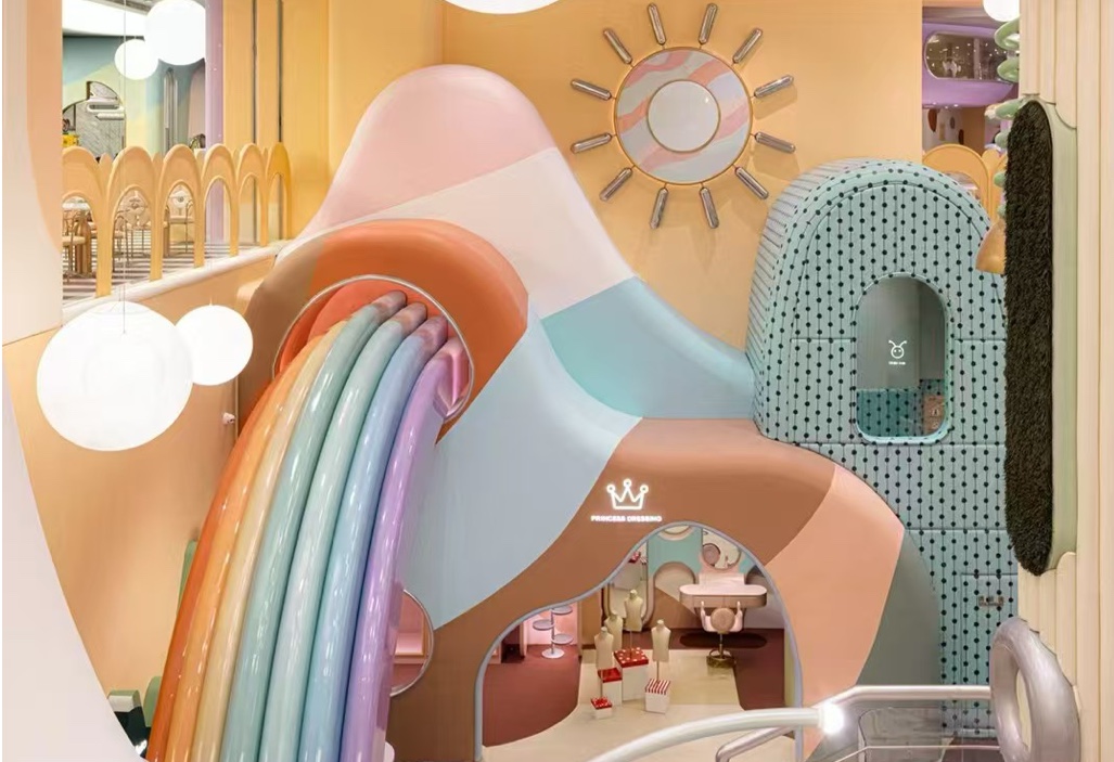 Children retail interior with colorful product displays and curved pastel walls