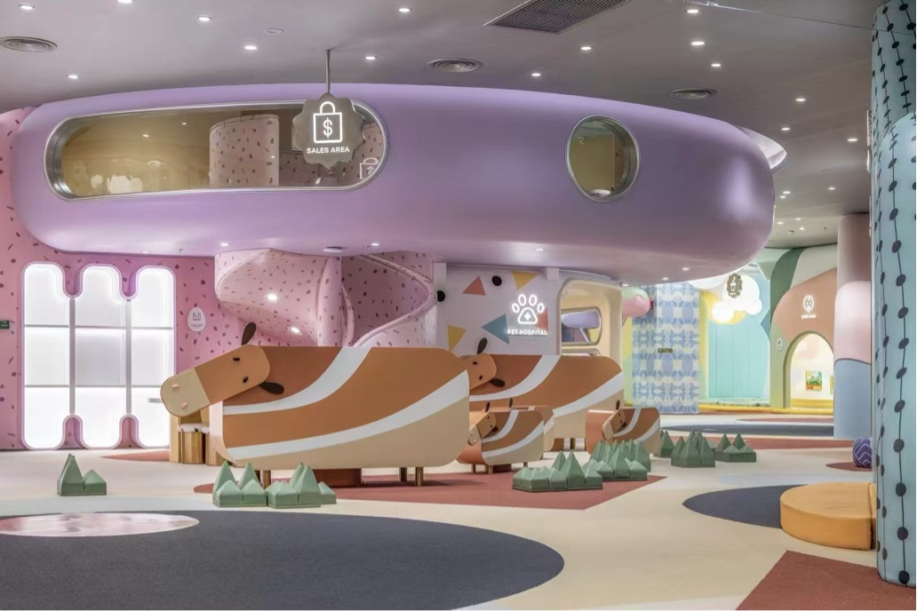 Family retail interior with lavender ceiling, rounded seating and custom display wall